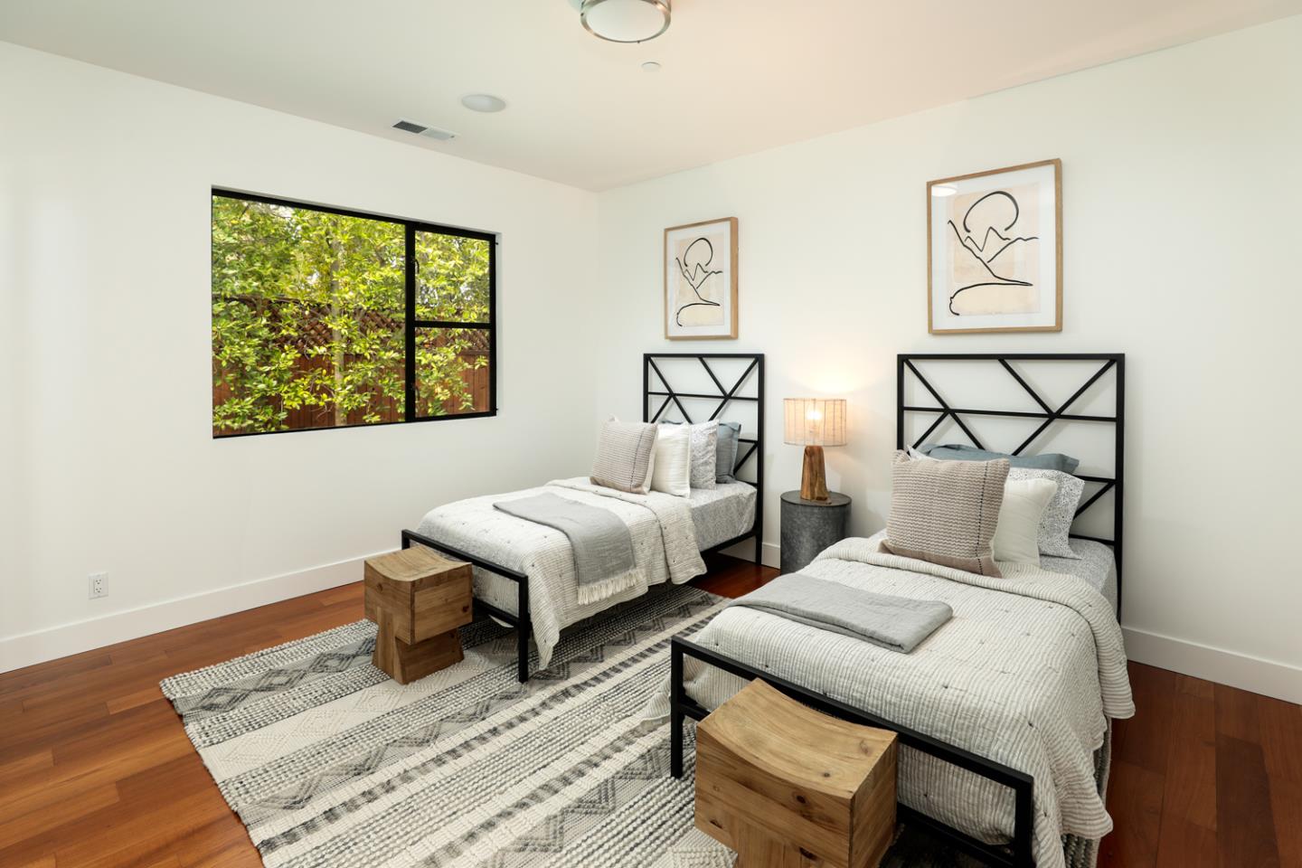 1136 Miramonte Avenue Los Altos, CA 94024 - Photo 31 of 58 a bedroom with two beds and a wooden floor