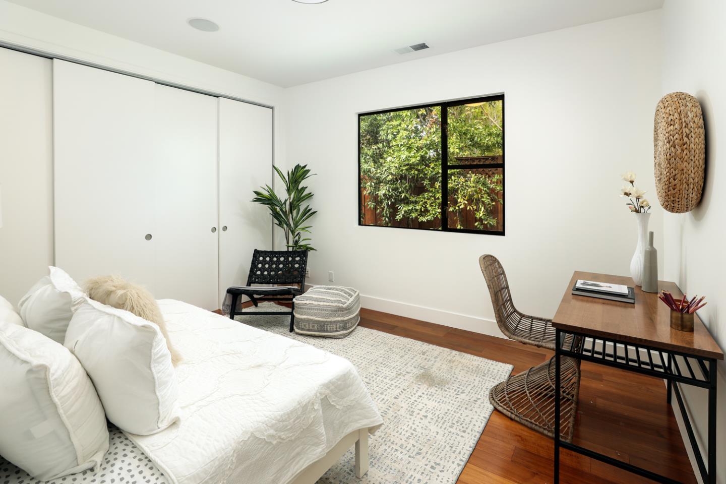 1136 Miramonte Avenue Los Altos, CA 94024 - Photo 32 of 58 a bedroom with a bed and a window
