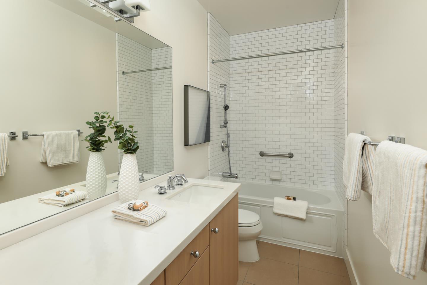 1136 Miramonte Avenue Los Altos, CA 94024 - Photo 33 of 58 a bathroom with a sink toilet and shower