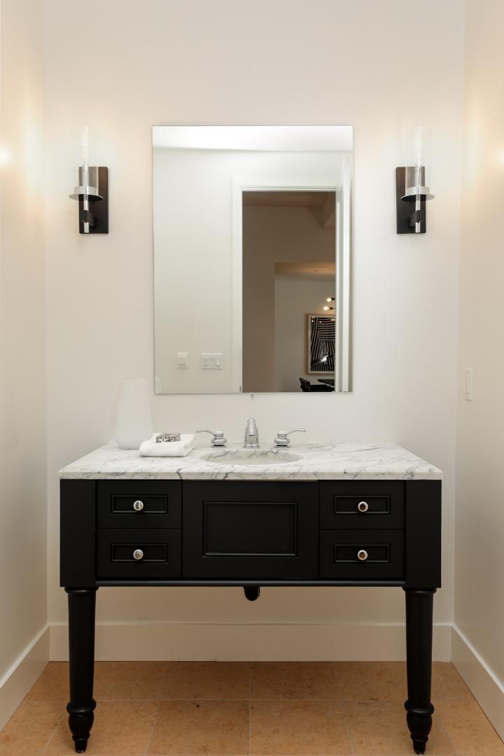 1136 Miramonte Avenue Los Altos, CA 94024 - Photo 37 of 58 a bathroom with a sink and a mirror