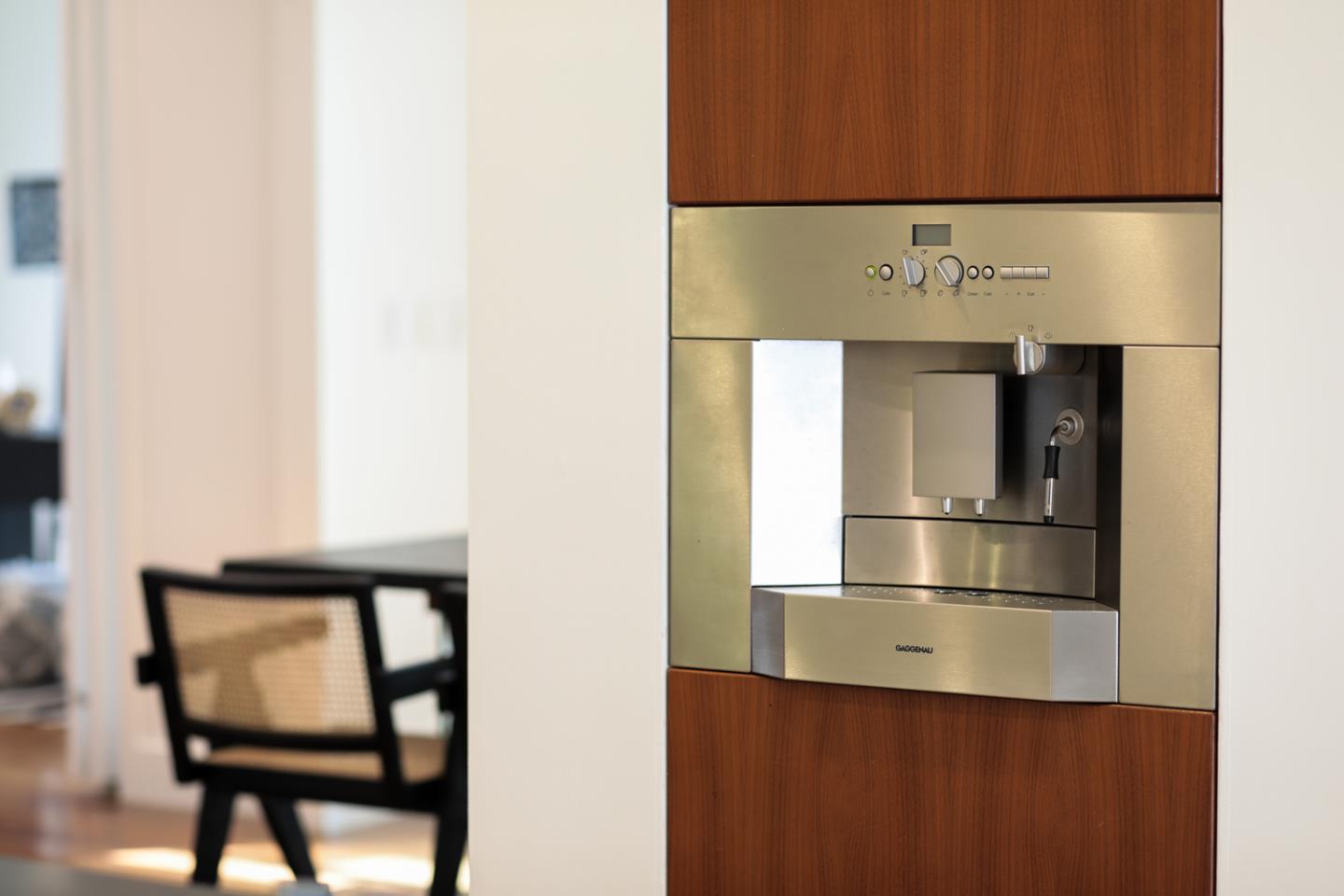 1136 Miramonte Avenue Los Altos, CA 94024 - Photo 47 of 58 a kitchen with a refrigerator and cabinets