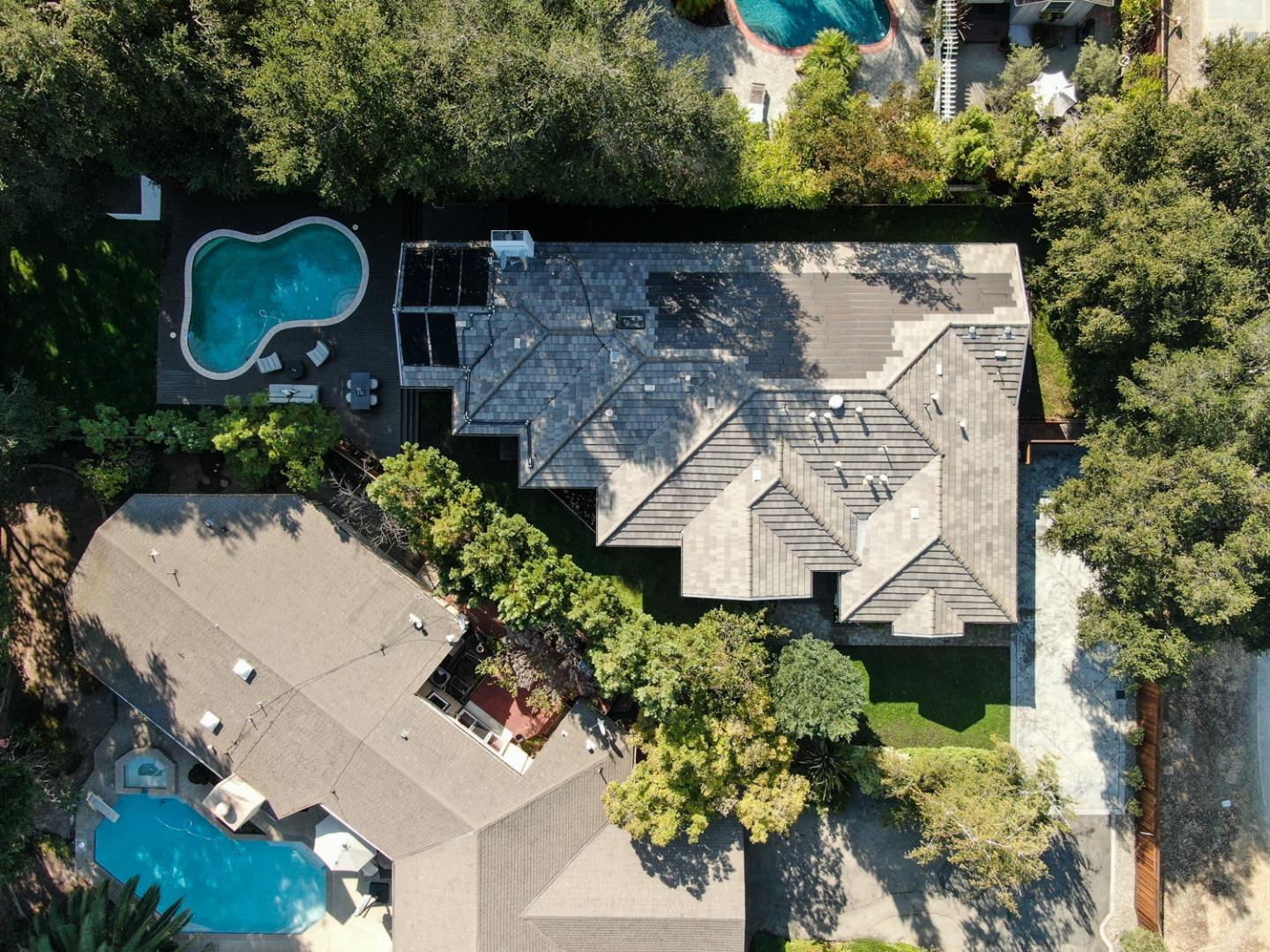 1136 Miramonte Avenue Los Altos, CA 94024 - Photo 51 of 58 an aerial view of a house with a yard and a large tree