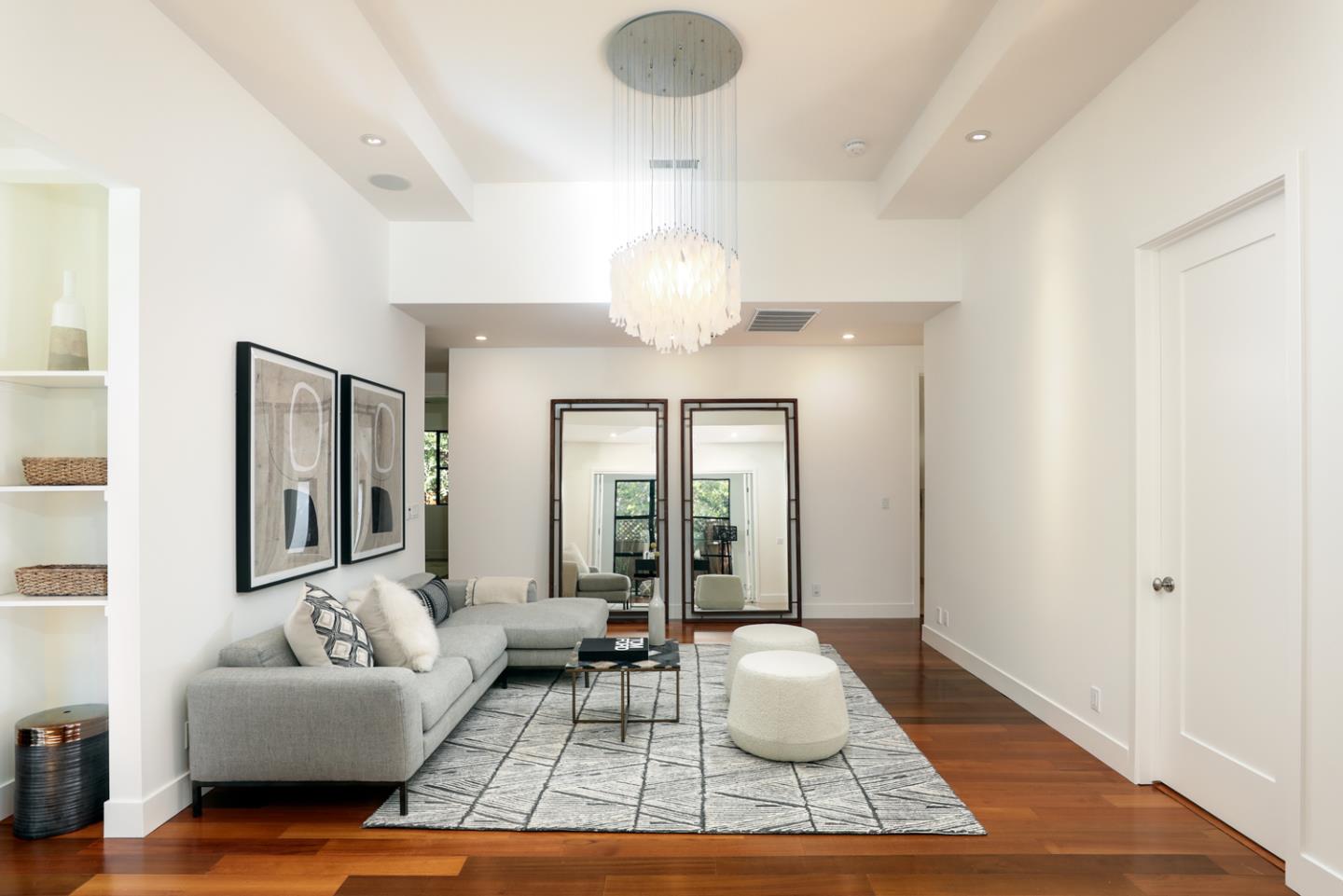 1136 Miramonte Avenue Los Altos, CA 94024 - Photo 6 of 58 a living room with furniture and a chandelier