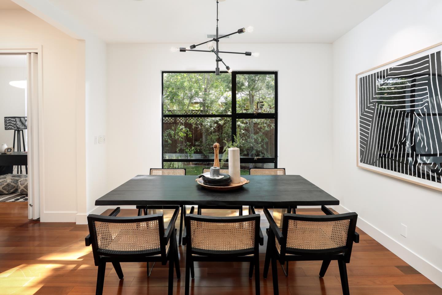 1136 Miramonte Avenue Los Altos, CA 94024 - Photo 7 of 58 a view of a dining room with furniture and wooden floor