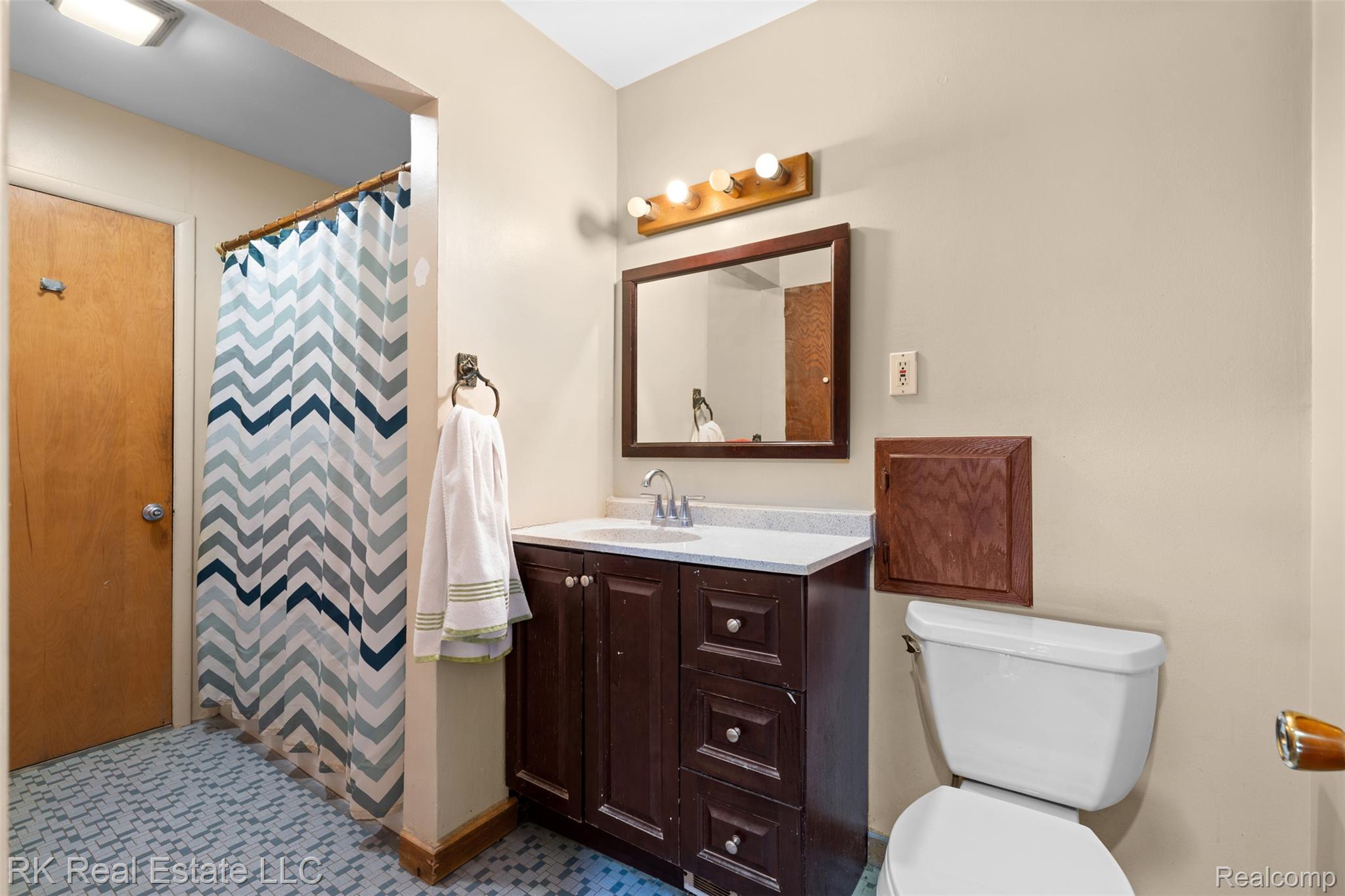 13799 31 Mile Road Washington, MI 48095 - Photo 19 of 40 Bathroom featuring a shower with shower curtain and vanity
