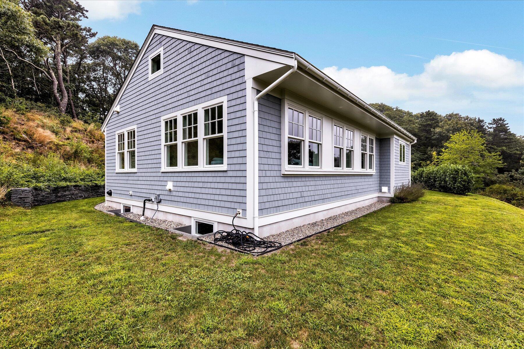 30 Long Nook Road Truro, MA 02666 - Photo 3 of 37 a view of a house with a yard