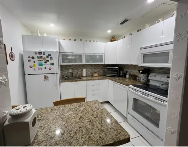 a bedroom with a bed and furniture