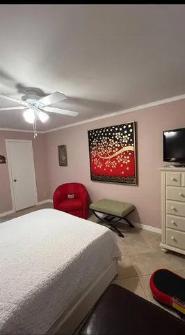 a room with painting and a table