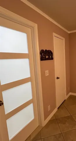 a white toilet sitting next to a bath tub