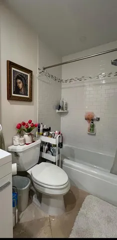 a room with furniture and a window