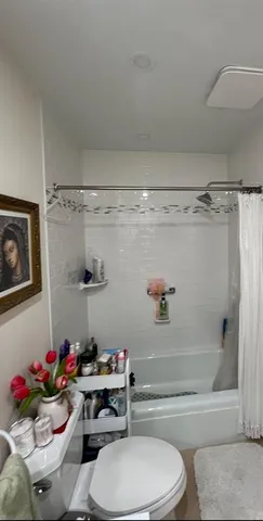 a view of a patio with table and chairs potted plants with wooden floor