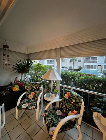 a park with lots of palm trees and lake