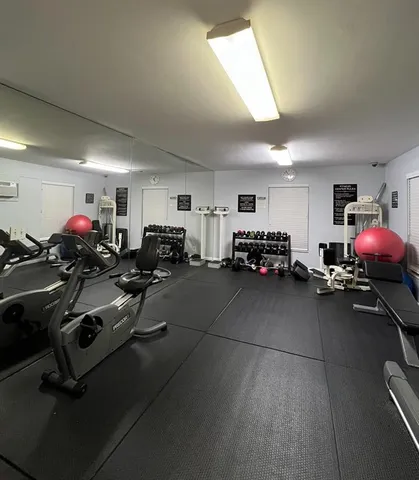 a view of a room with gym equipment
