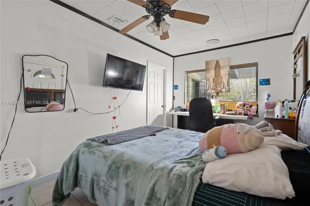 a bathroom with a sink and mirror with toilet
