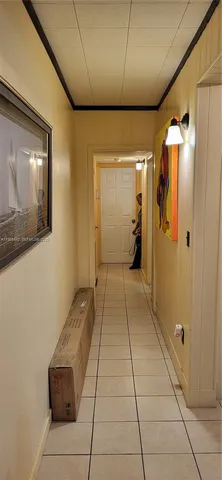 a view of a backyard with pathway