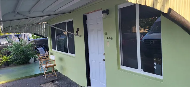 a view of a couches in front of house