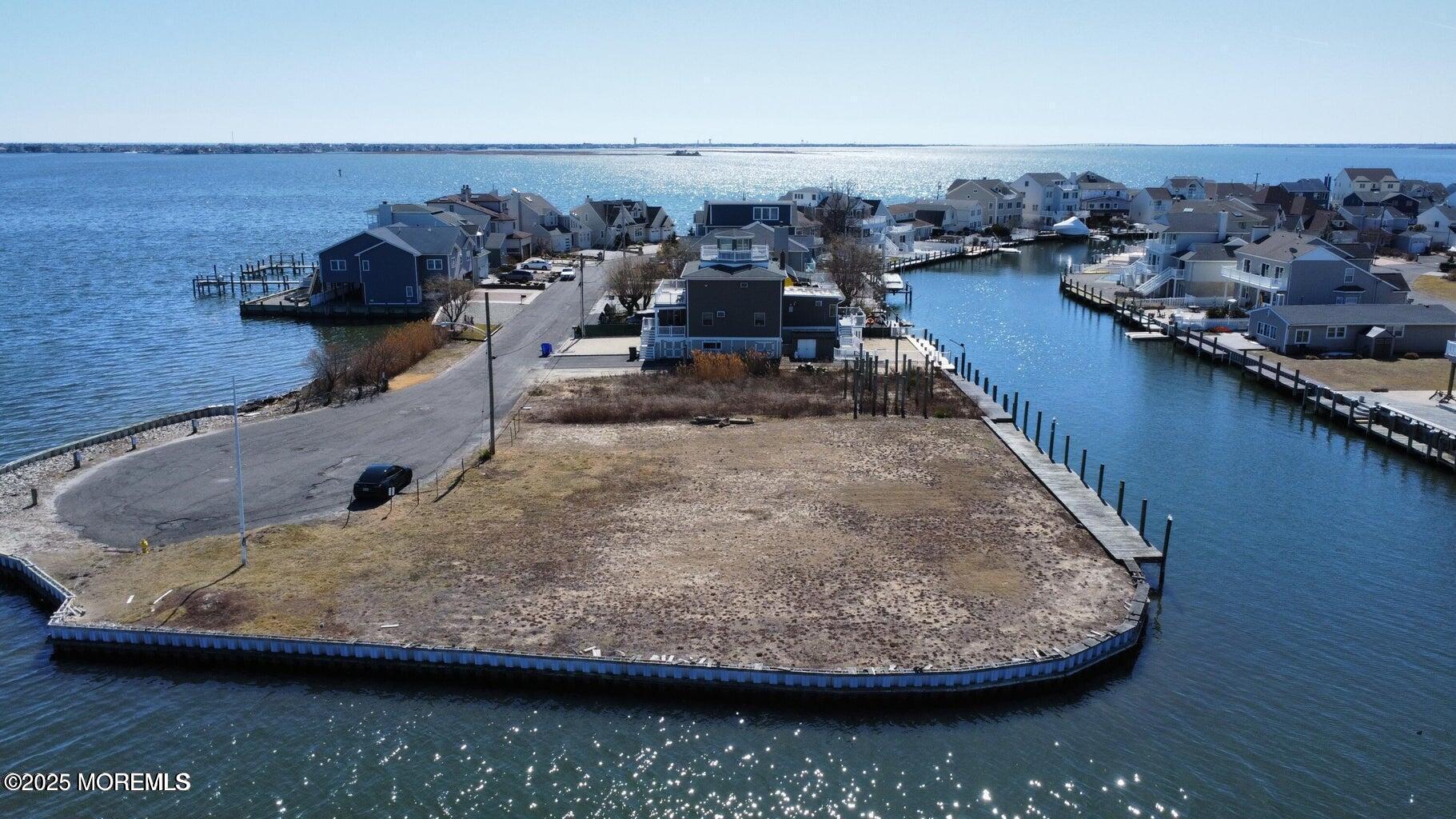 108 Rochester Drive Brick, NJ 08723 - Photo 14 of 31 a view of a swimming pool with lawn chairs