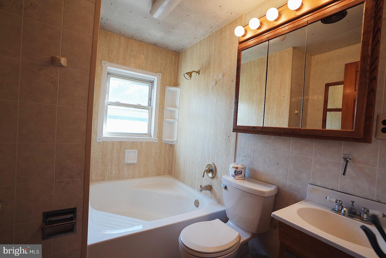 7 Princeton Avenue Fortescue, NJ 08321 - Photo 44 of 79 a bathroom with a sink a toilet and bathtub