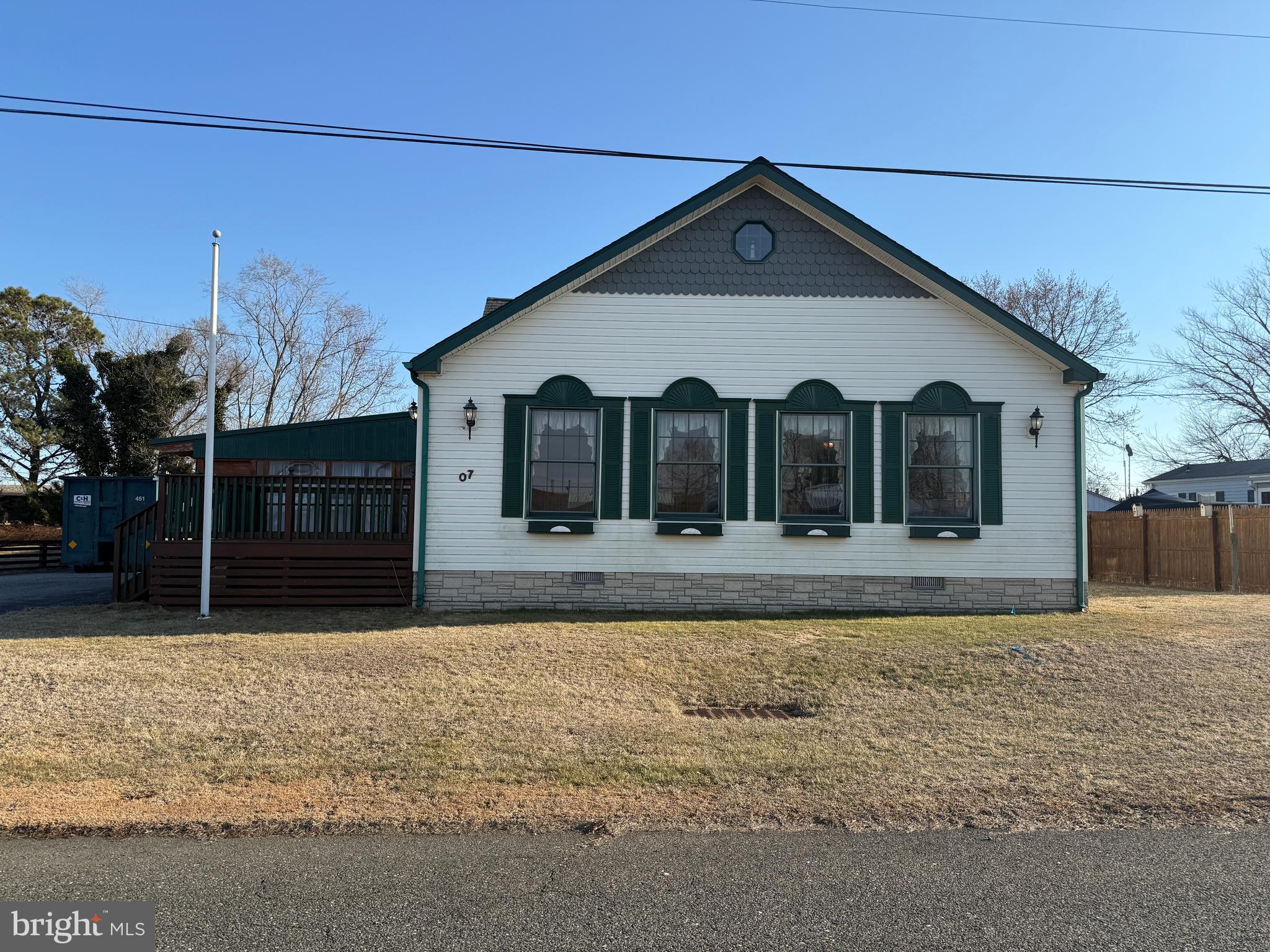 7 Princeton Avenue Fortescue, NJ 08321 - Photo 5 of 79 a front view of a house with a yard