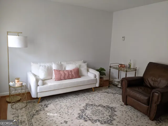 a living room with furniture and a couch
