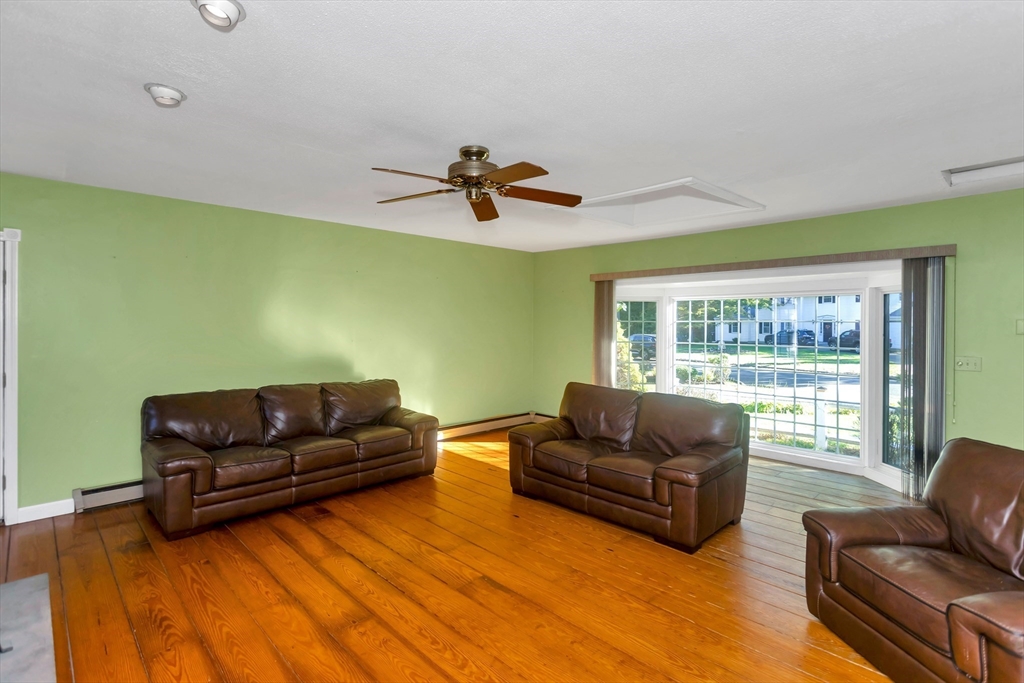 11 Longfellow Road Holyoke, MA 01040 - Photo 11 of 37 a living room with furniture and a window