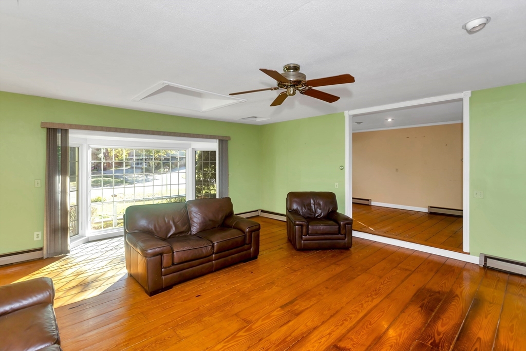 11 Longfellow Road Holyoke, MA 01040 - Photo 12 of 37 a living room with furniture and a window