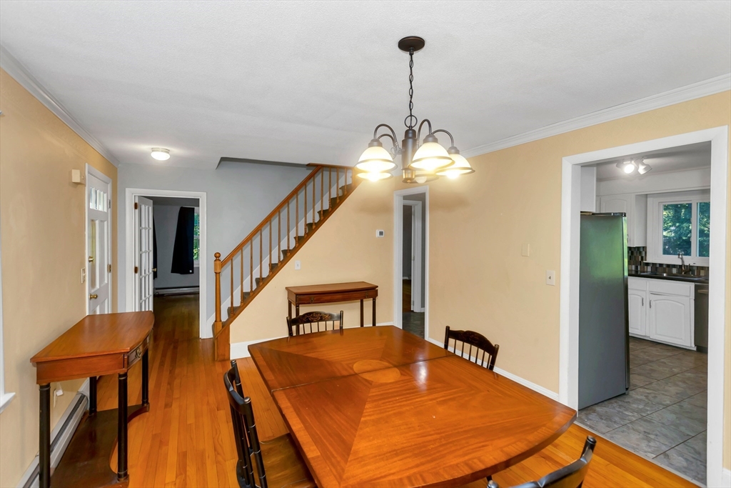 11 Longfellow Road Holyoke, MA 01040 - Photo 19 of 37 a room with lots of furniture and wooden floor