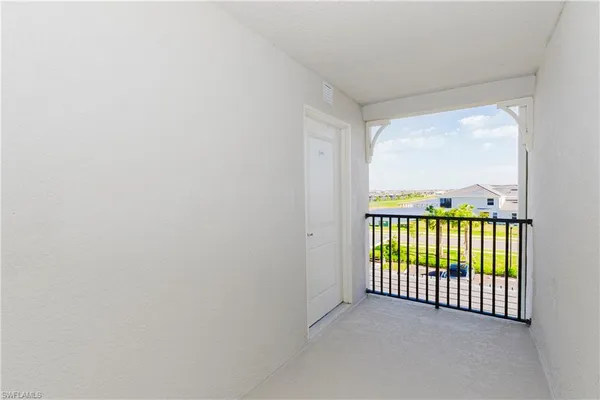 a view of a room with a large window