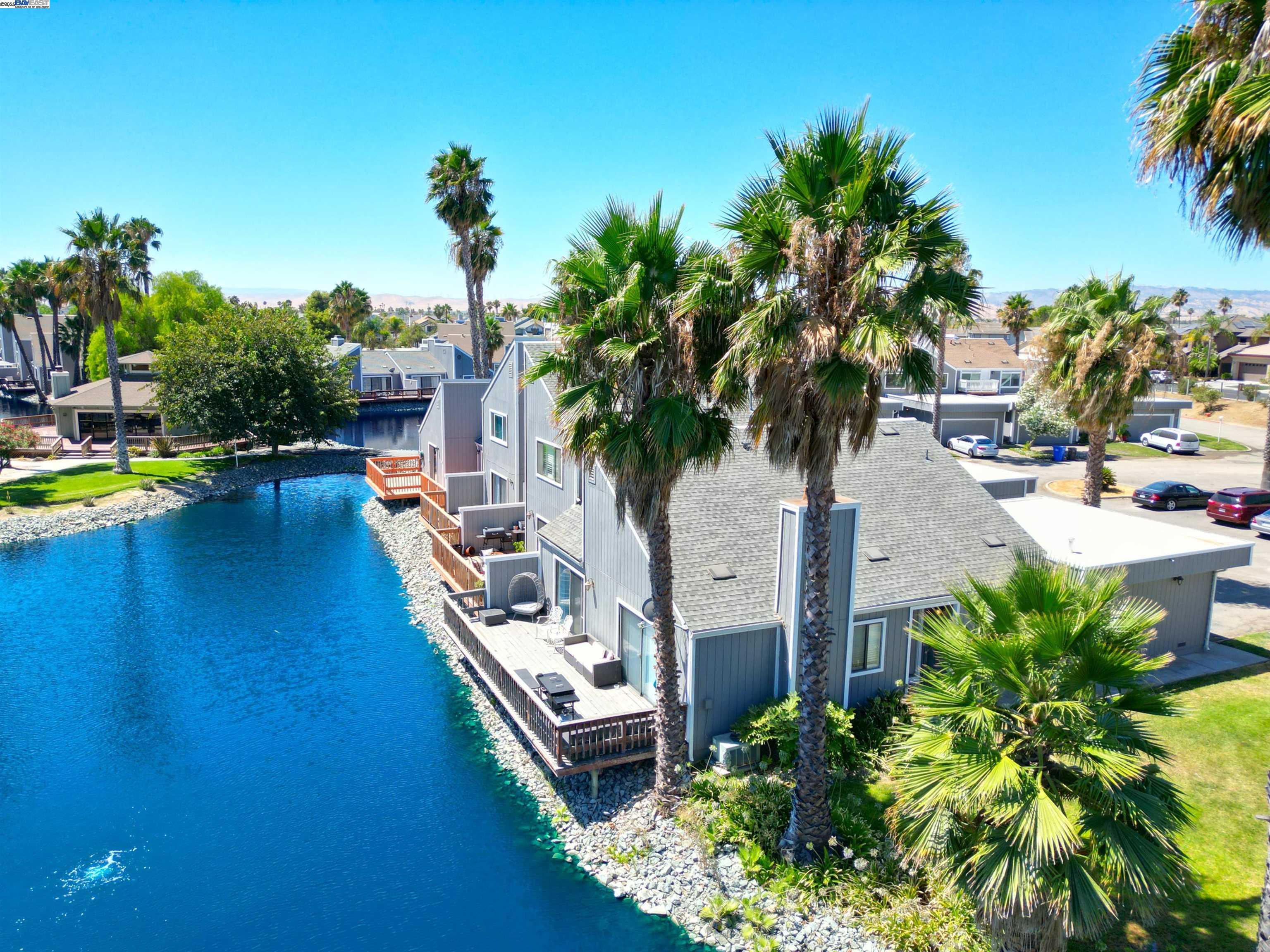 2073 Sand Point Road Discovery Bay, CA 94505 - Photo 16 of 40 a view of a house with swimming pool and sitting area