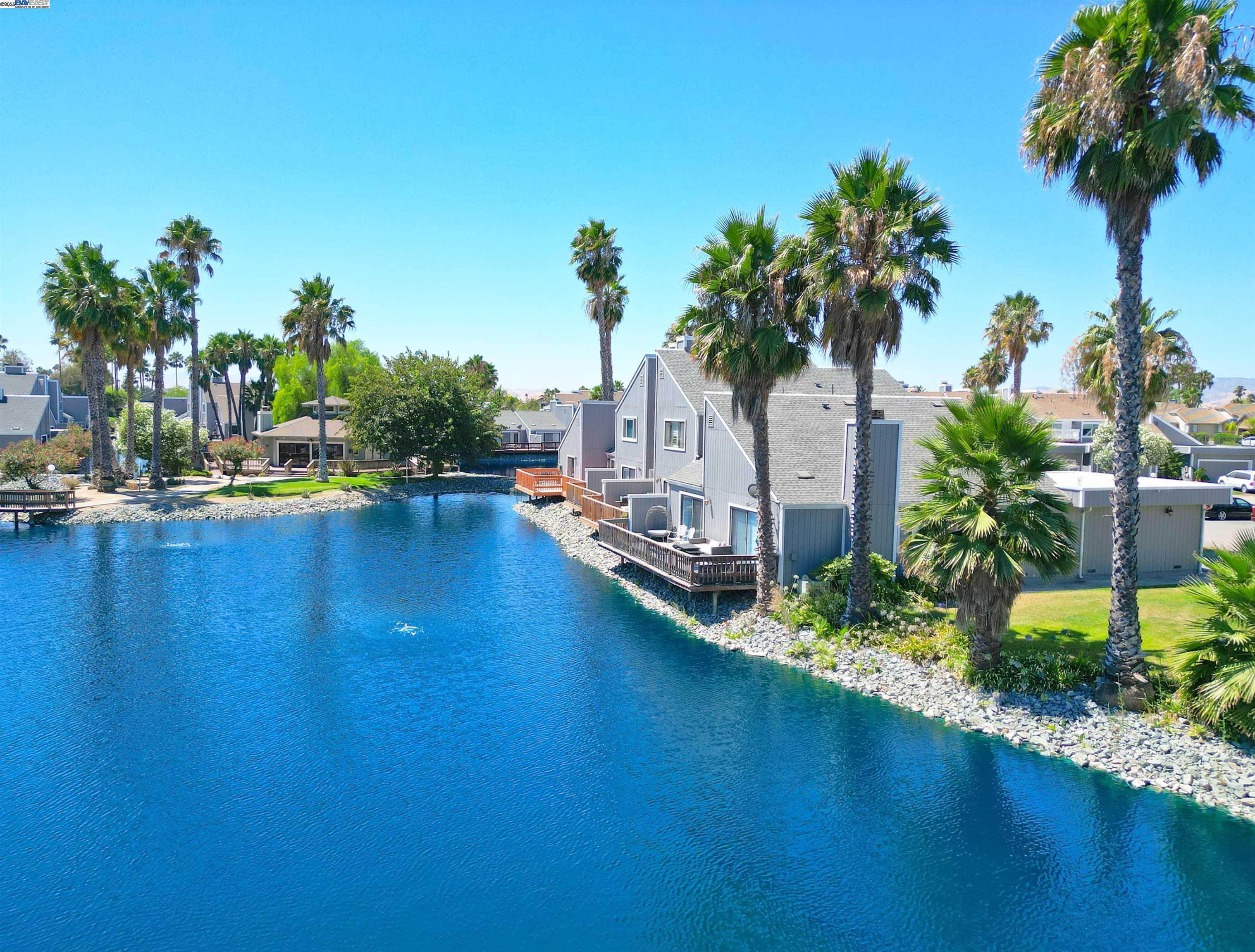 2073 Sand Point Road Discovery Bay, CA 94505 - Photo 22 of 40 a view of a lake with houses