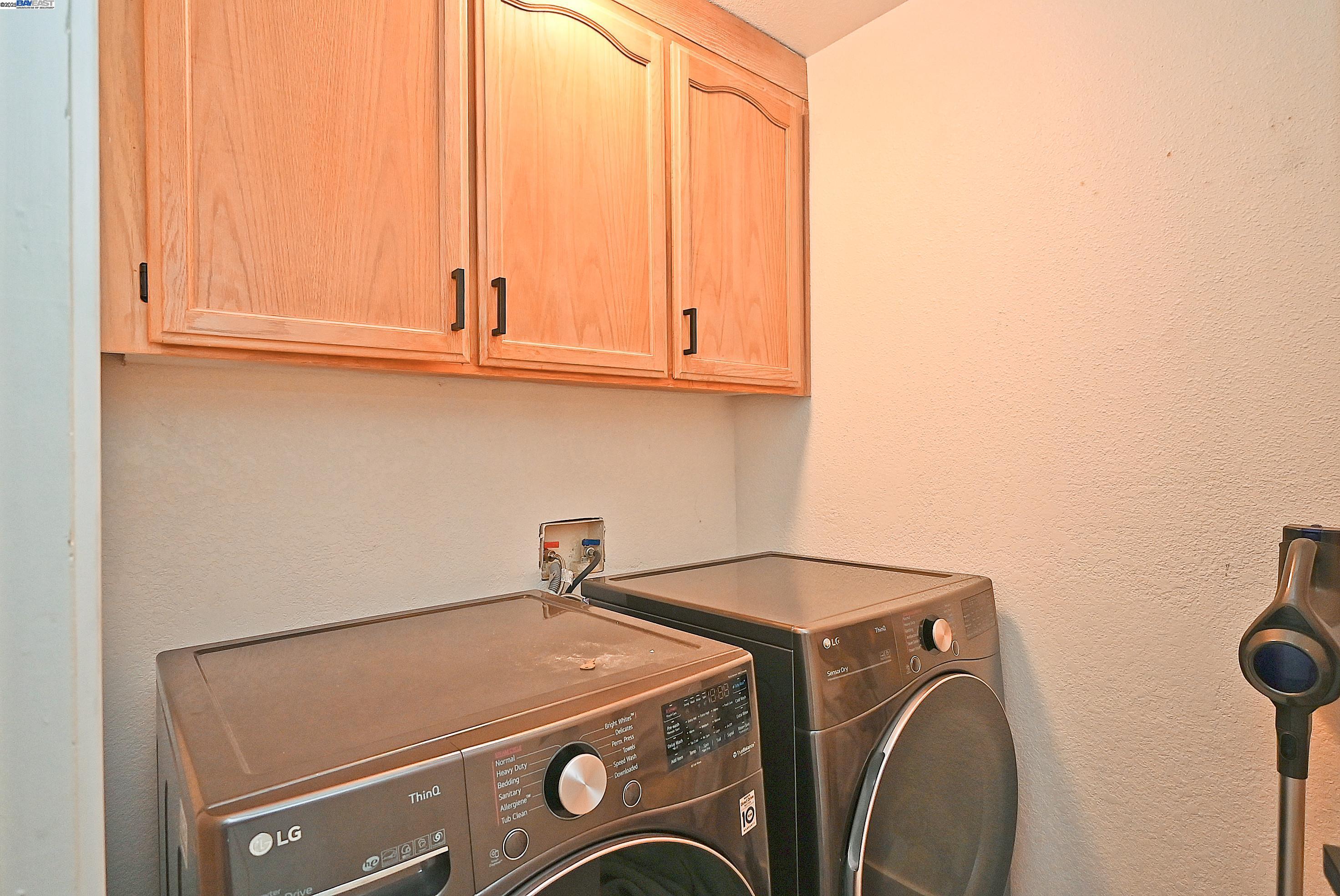 2073 Sand Point Road Discovery Bay, CA 94505 - Photo 37 of 40 a utility room with dryer and washer