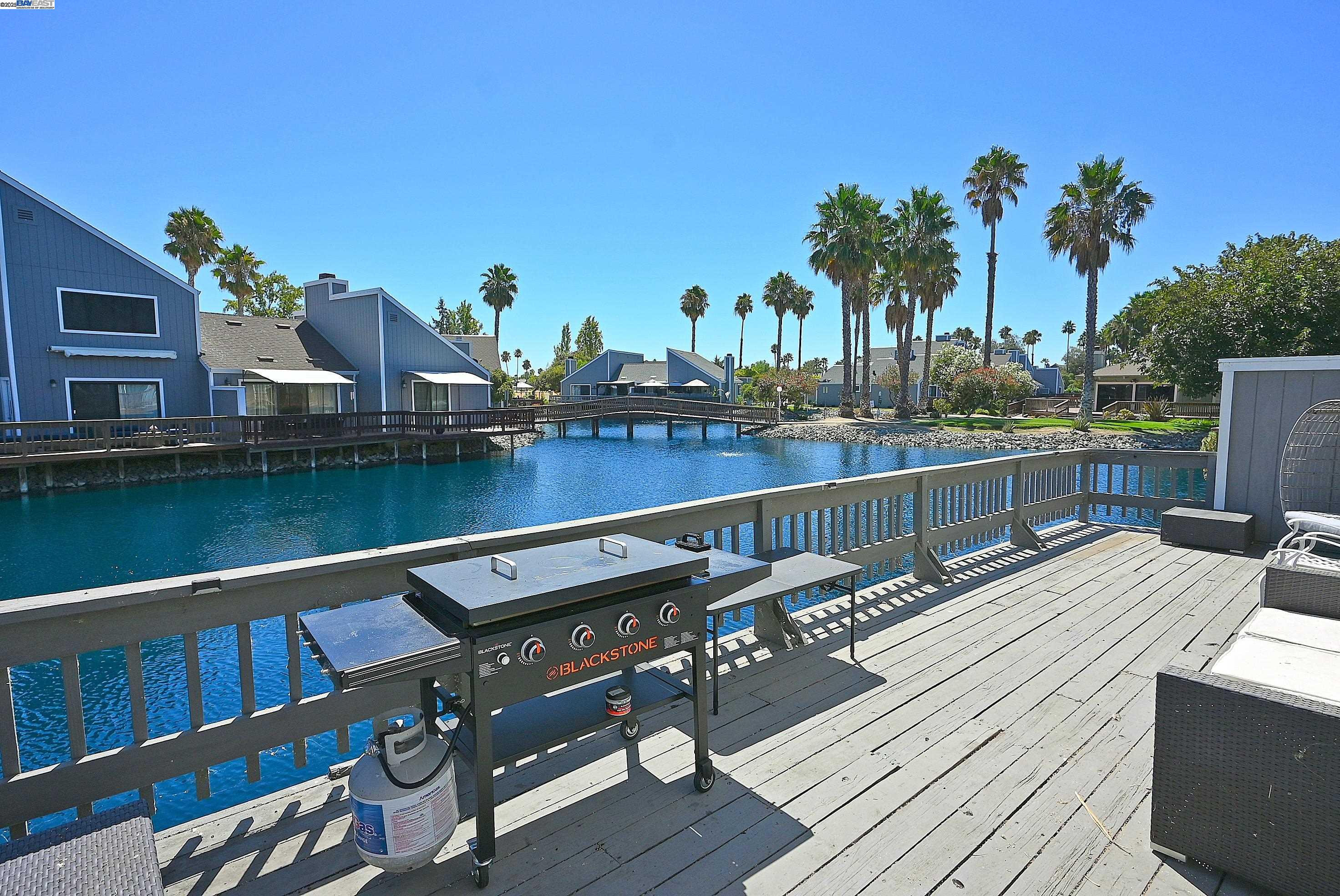 2073 Sand Point Road Discovery Bay, CA 94505 - Photo 5 of 40 a view of a balcony with wooden floor and outdoor space
