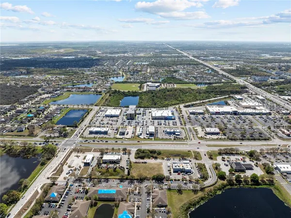 an aerial view of a city with lots of residential buildings