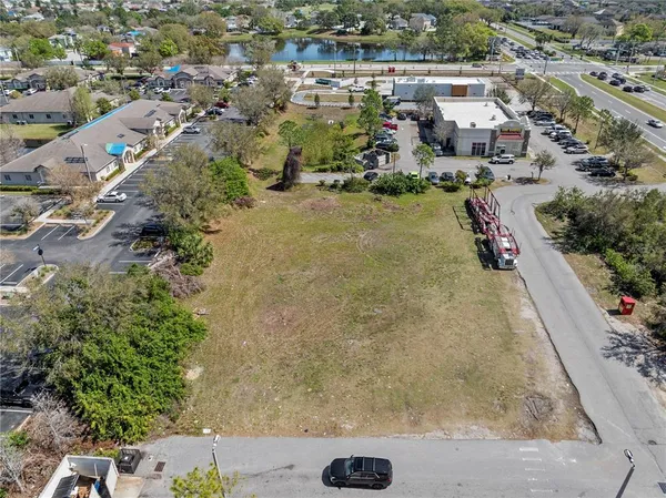 an aerial view of residential building and lake view