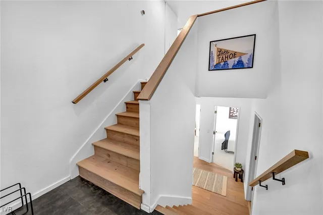 a view of a house with a yard and garage