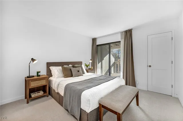 a view of entryway with stairs and wooden floor