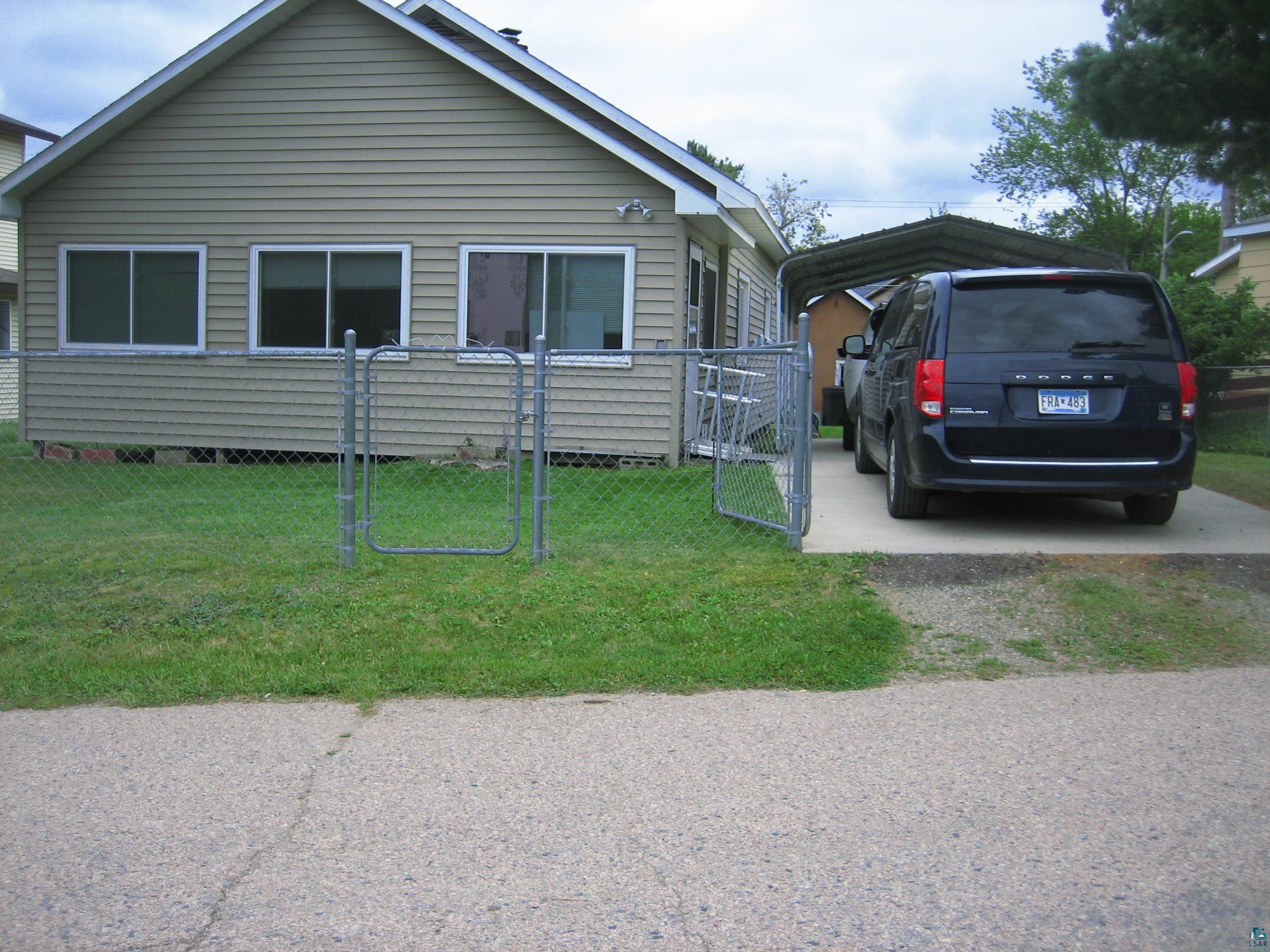 548 Front Street Winton, MN 55796 - Photo 2 of 17 View of front of property with a front yard