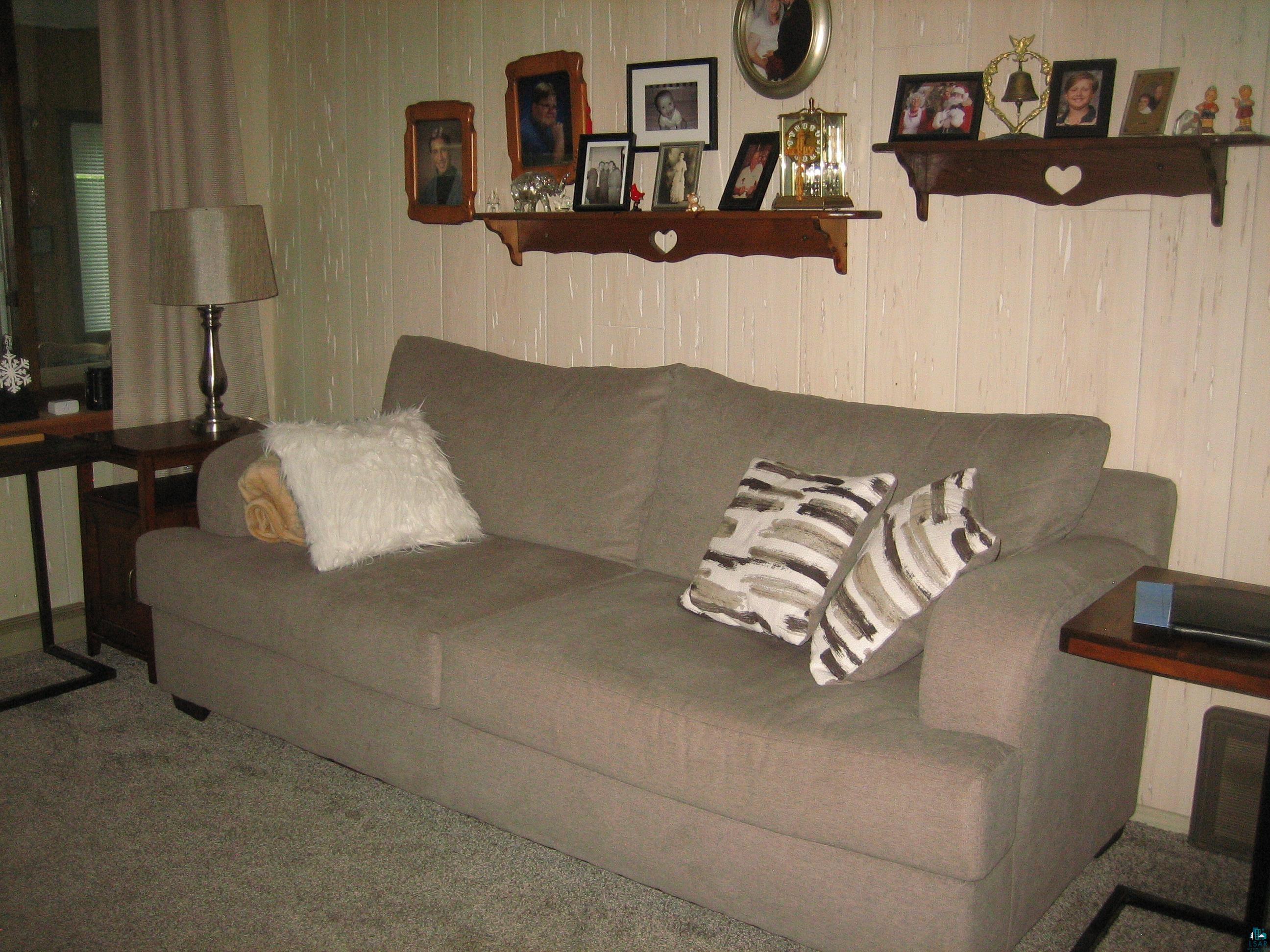 548 Front Street Winton, MN 55796 - Photo 3 of 17 Living room featuring carpet floors
