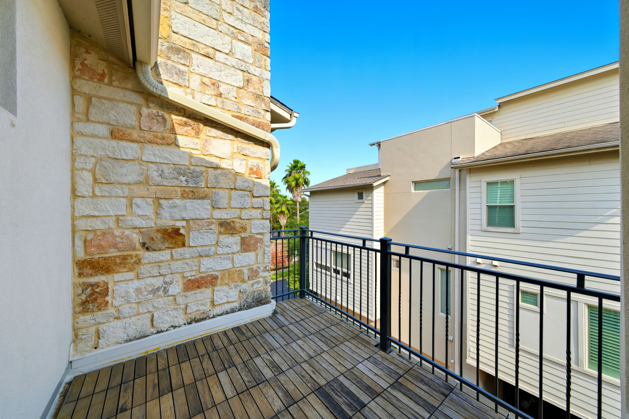 4915 Chenevert Street Houston, TX 77004 - Photo 24 of 41 Spa-inspired primary bath offers a deep soaking tub with mosaic tile surround, a spacious glass-enclosed walk-in shower, and dual vanities with marble countertops. An extended prep vanity and abundant built-in storage create a serene retreat ideal for unwinding after a busy day.