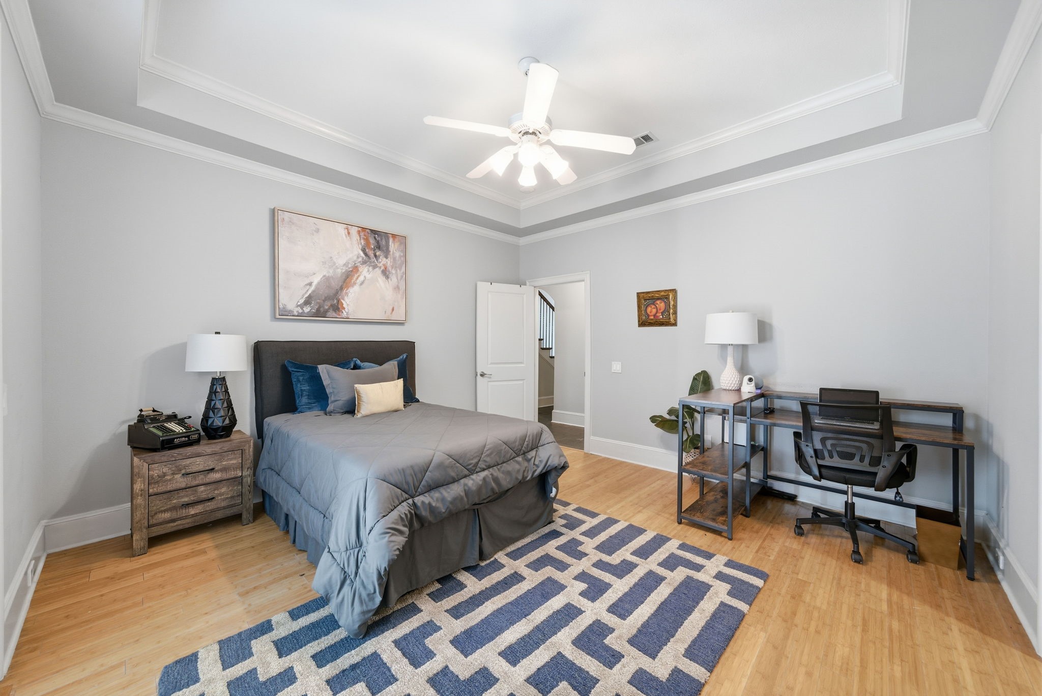 4915 Chenevert Street Houston, TX 77004 - Photo 30 of 41 Crisp white cabinetry and a marble countertop set a contemporary tone in this well-appointed full bath. A spacious walk-in shower with modern tile, ample vanity storage, and designer lighting provide comfort and convenience for residents or guests alike.