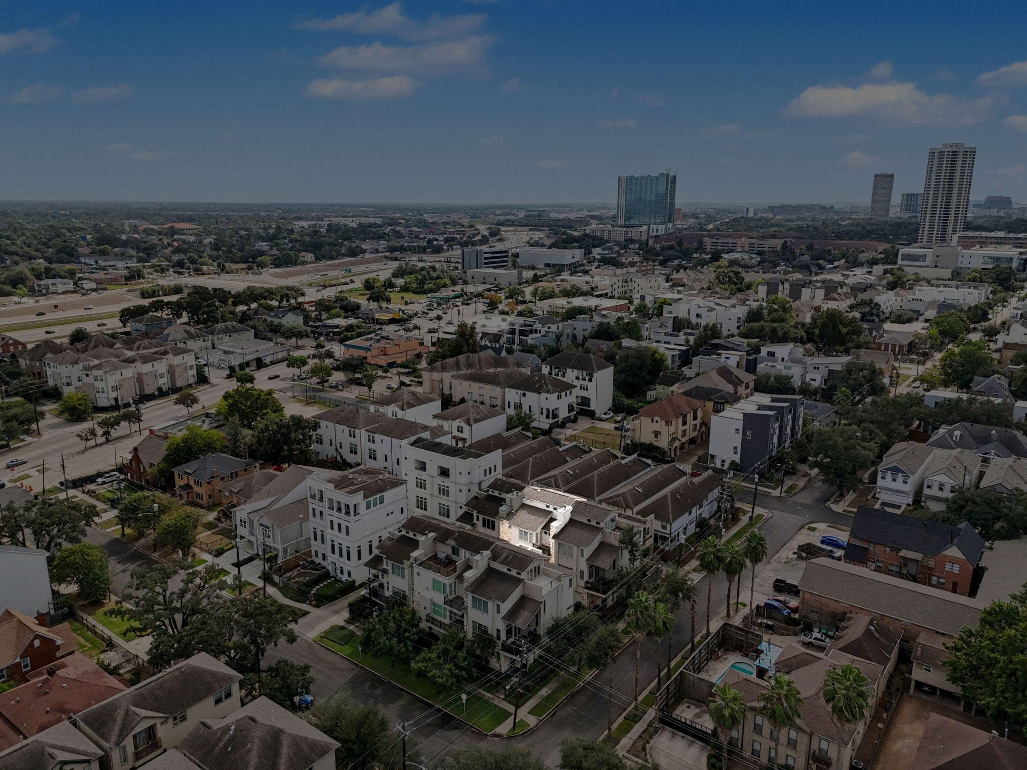 4915 Chenevert Street Houston, TX 77004 - Photo 40 of 41 Aerial view showcases the prime location in the Rice/Museum District, emphasizing proximity to Downtown, major highways, METRORail, and Memorial Park. Gated community setting offers a contemporary lifestyle with elevator-capable homes and easy access to Houston’s vibrant cultural and business centers.
