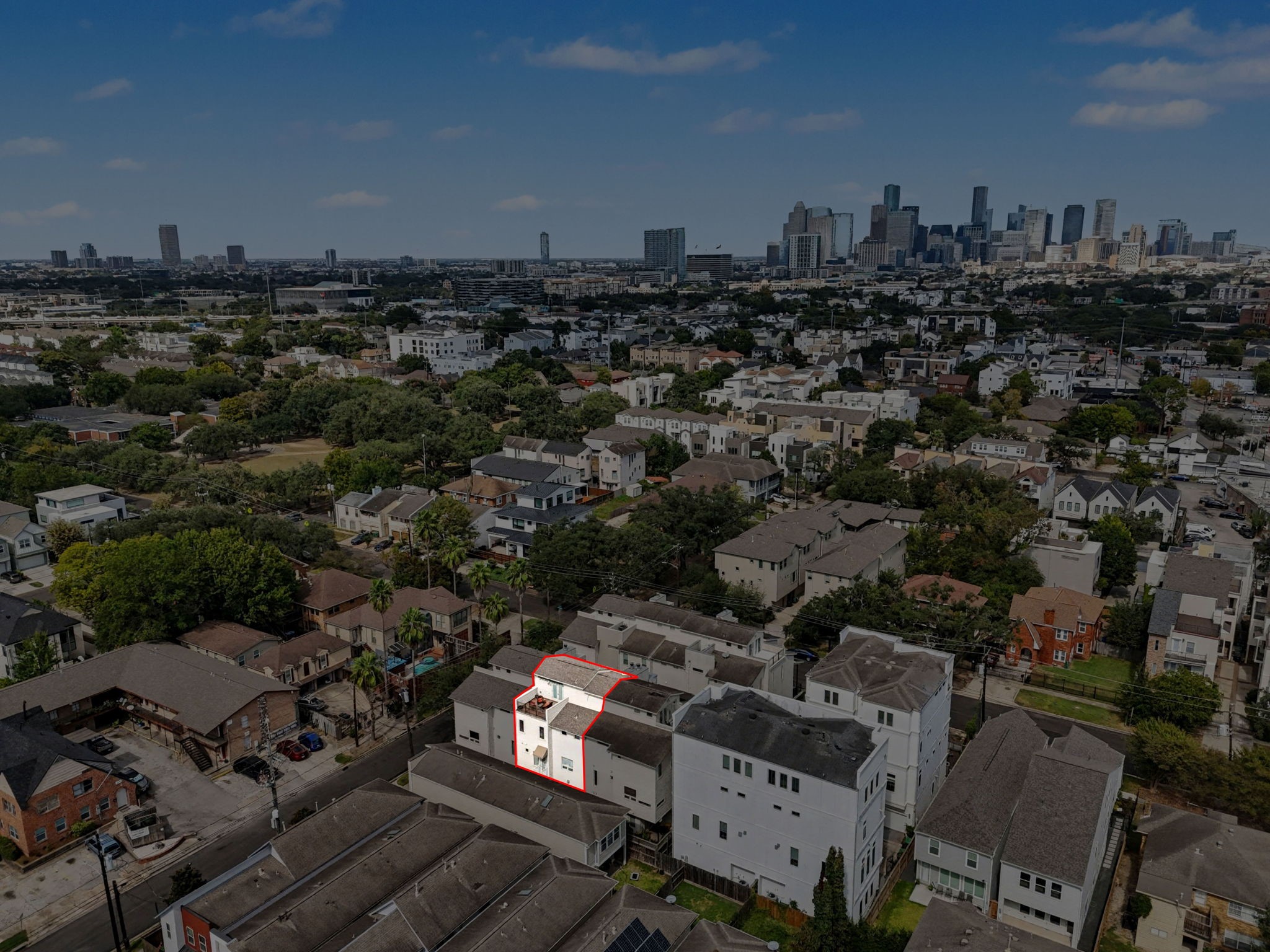 4915 Chenevert Street Houston, TX 77004 - Photo 5 of 41 Highlighted within a gated enclave, this contemporary residence boasts a low-maintenance lot with four stories of modern living in the Rice/Museum District. Enjoy sweeping proximity to METRORail, major highways, and iconic Houston destinations, all from the comfort of an elevator-capable, energy-efficient home.