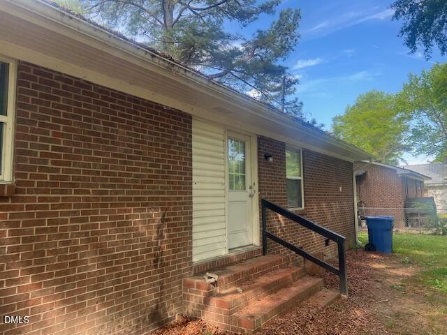417 Lane Street Southeast Wilson, NC 27893 - Photo 2 of 2 a view of house with backyard and trees