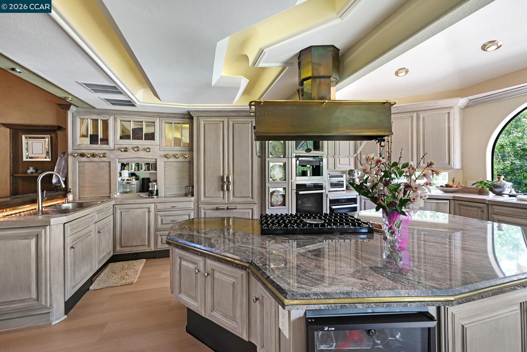 490 St Marys Road Lafayette, CA 94549 - Photo 20 of 61 a kitchen with stainless steel appliances granite countertop a sink and cabinets