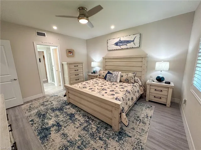 a bed room with a bed and a couch