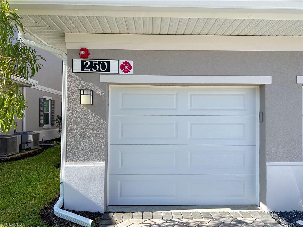 250 Indies Drive East, Unit 101 Naples, FL 34114 - Photo 3 of 49 a view of a door and utility room