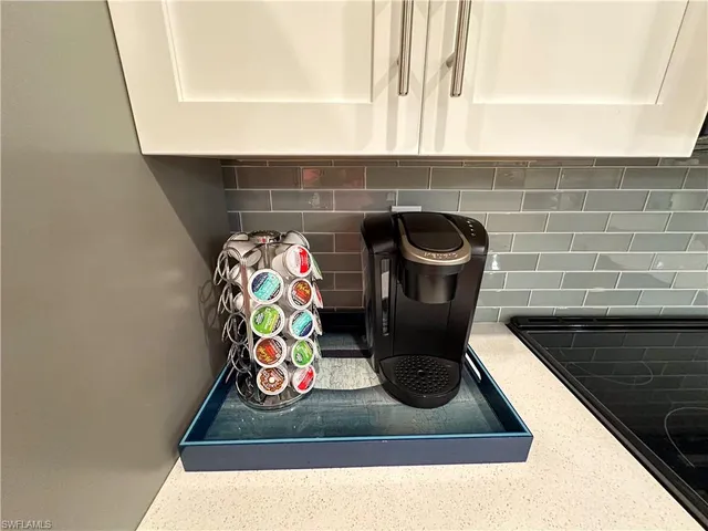 a room with water heater and utility