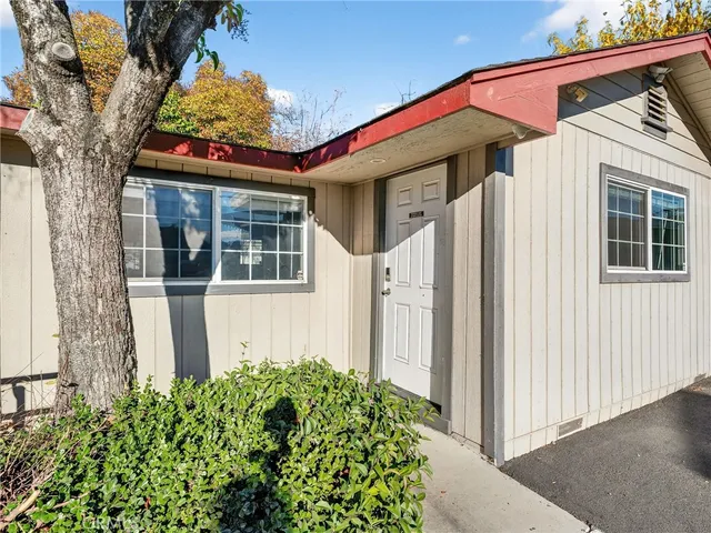 front view of a house with a small yard