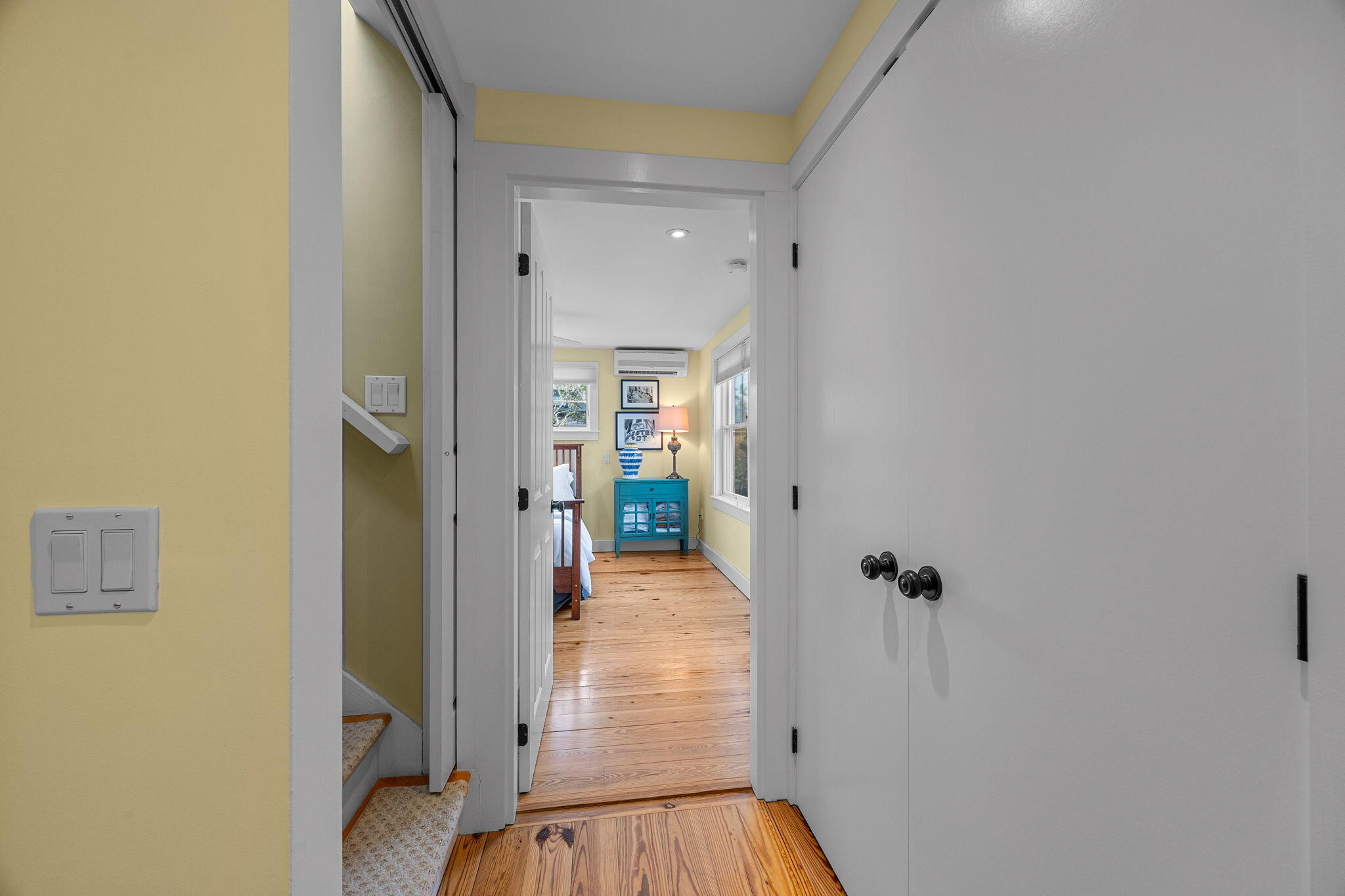 3 Meadow Road, Unit 2 Provincetown, MA 02657 - Photo 12 of 26 a view of a livingroom with wooden floor and a bathroom