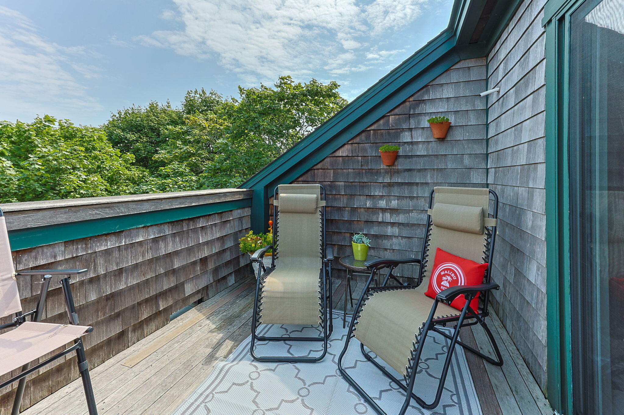3 Meadow Road, Unit 2 Provincetown, MA 02657 - Photo 19 of 26 a backyard of a house with seating space